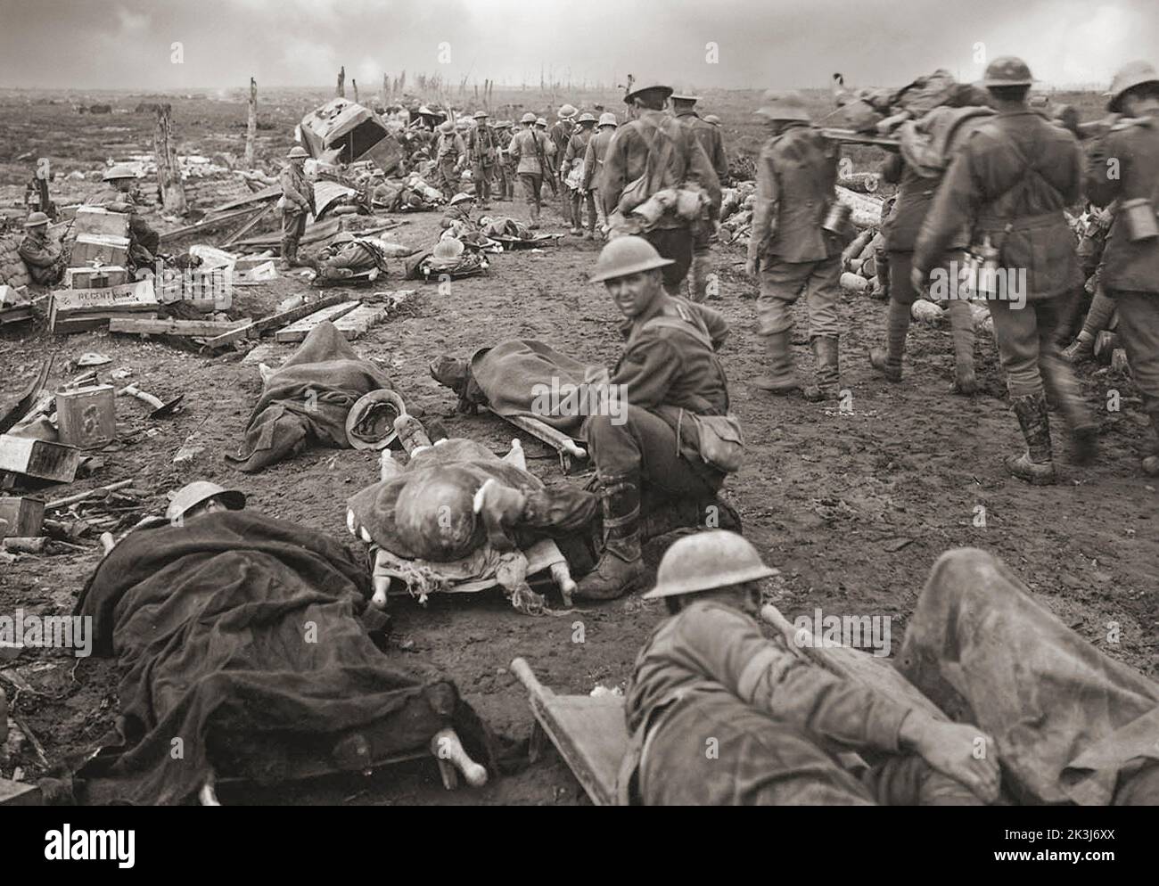 Men wounded in the Ypres battle of September 20th, 1917. Walking along the Menin road, to be taken to the clearing station during the Battle of Ypres. German prisoners are seen assisting at stretcher bearing. Stock Photo