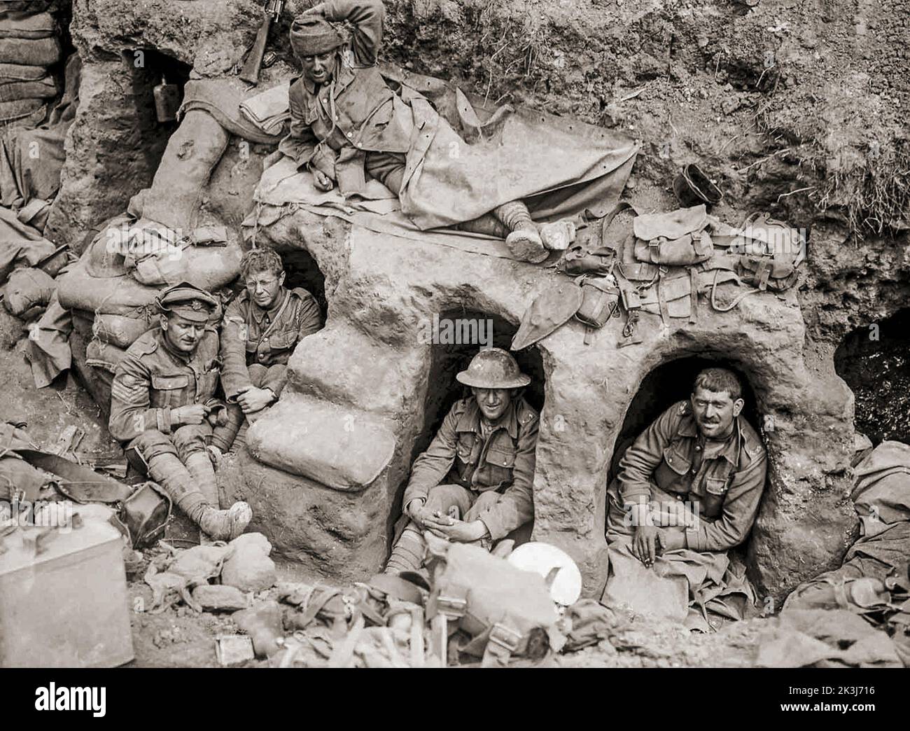 Men of the Border Regiment rest in shallow dugouts near Thiepval Wood. The Battle of Thiepval Ridge was the first large offensive of the Reserve Army under Lieutenant General Hubert Gough, during the Battle of the Somme on the Western Front during the First World War. Stock Photo