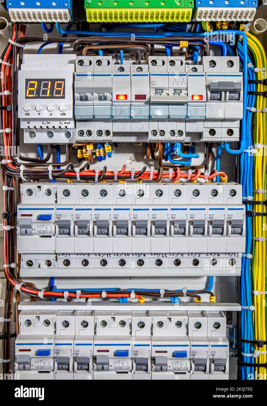 Voltage distributor with automatic switches. Electrical background