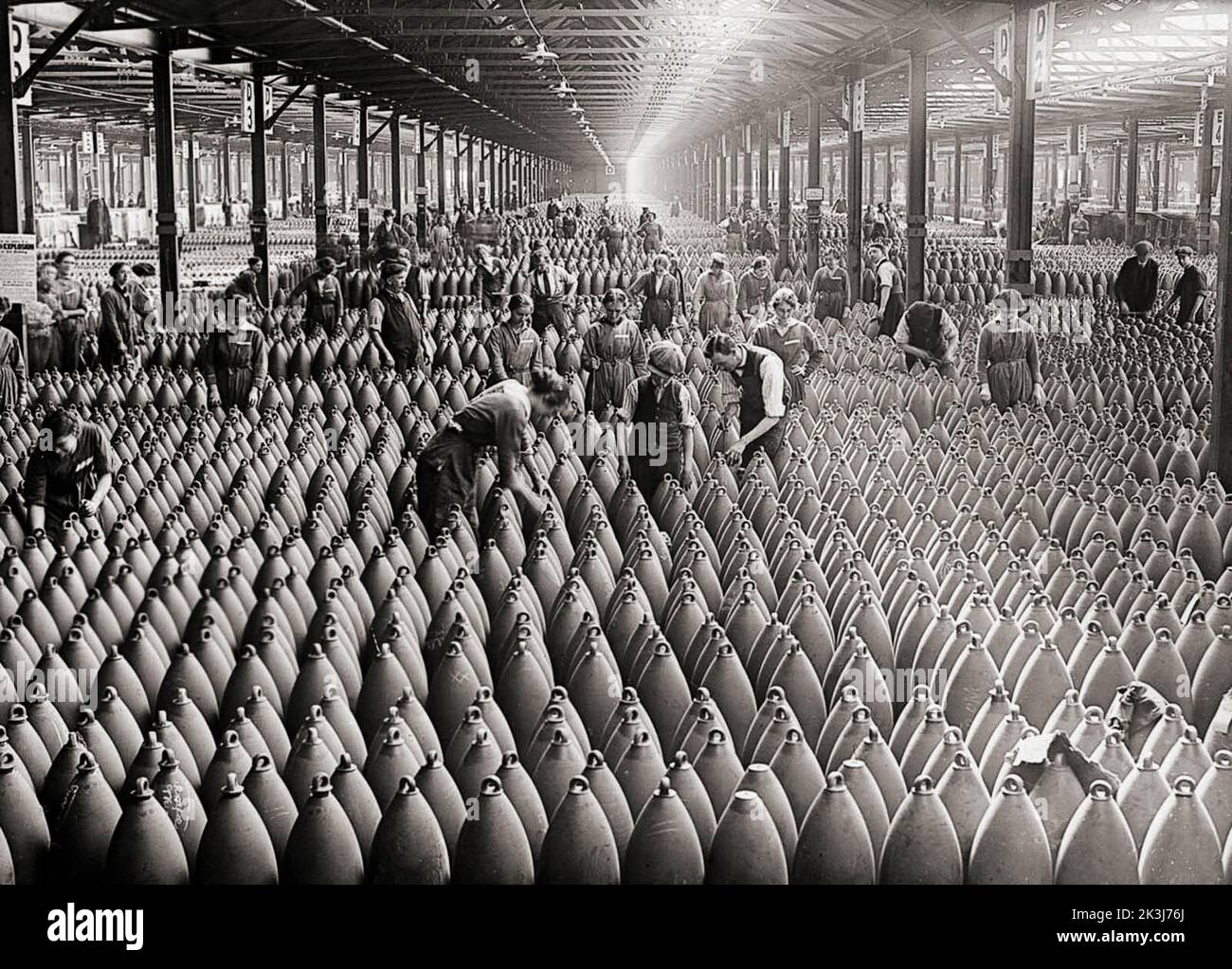 National Filling Factory in Chilwell in 1917. During World War One, large numbers of women were recruited into jobs vacated by men who had gone to fight in the war. The high demand for weapons resulted in the munitions factories becoming the largest single employer of women during 1918. By 1917 munitions factories, which primarily employed women workers, produced 80% of the weapons and shells used by the British Army. Stock Photo