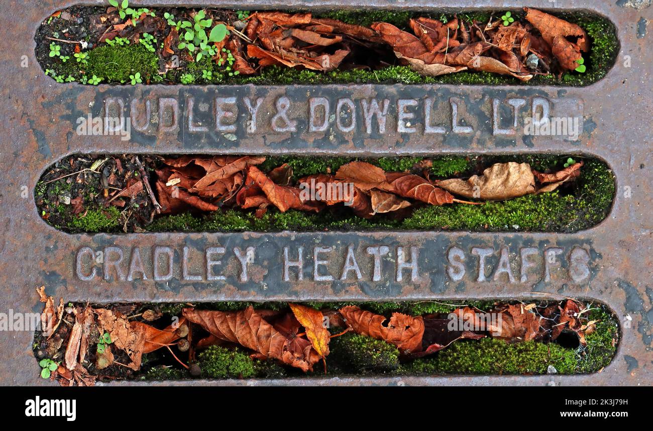 Cast Iron grid, embossed with Dudley & Dowell Ltd, Cradley Heath Staffs, England, UK Stock Photo