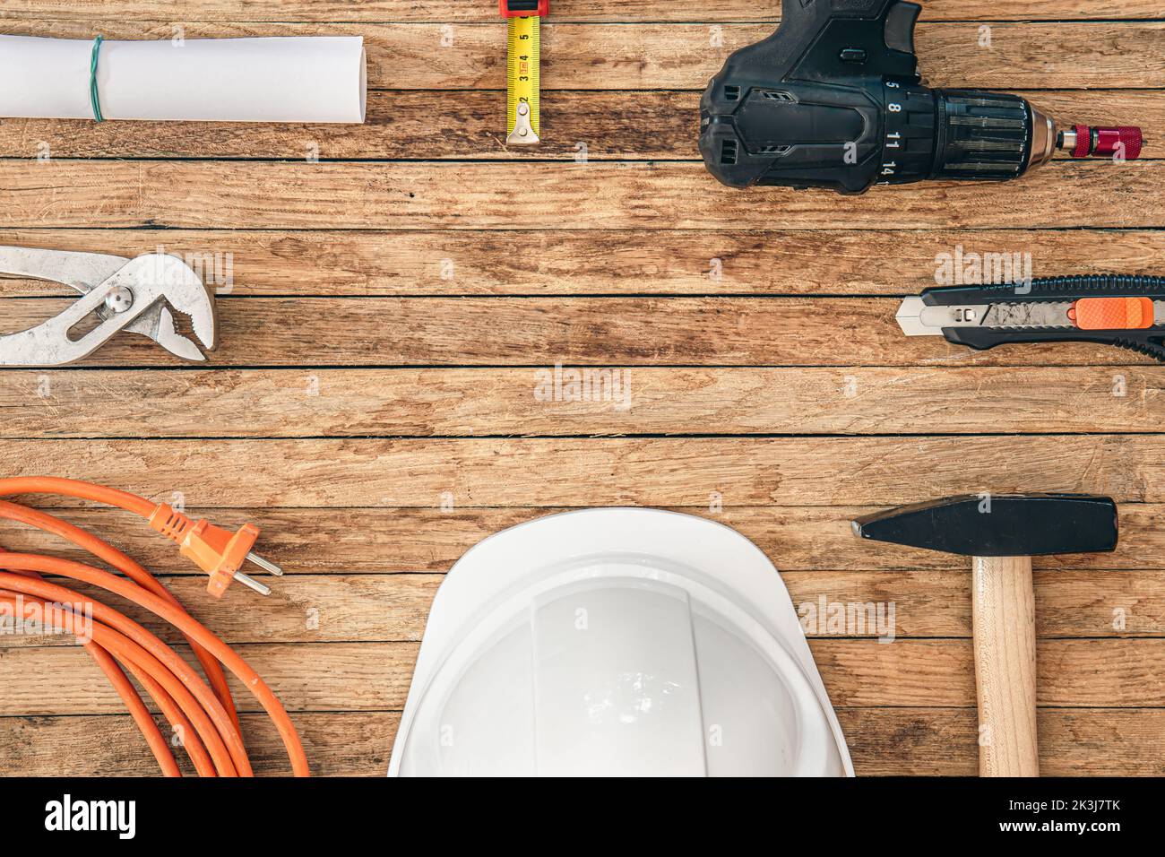 Flat lay composition with different construction tools on wooden background. Stock Photo