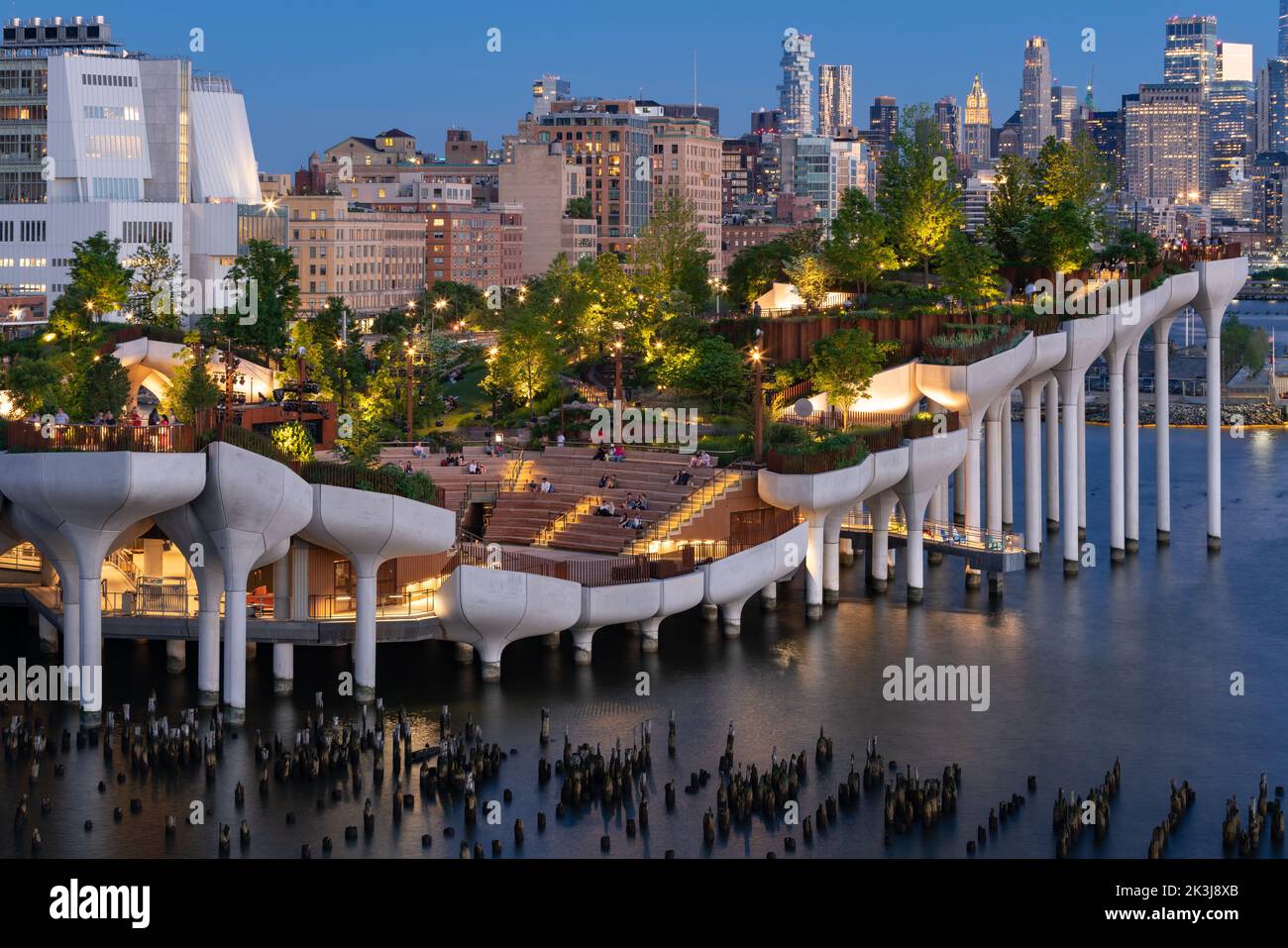 New York City, Little Island public park in evening. Elevated park with amphitheater at Hudson River Park (Pier 55), West Village, Manhattan Stock Photo