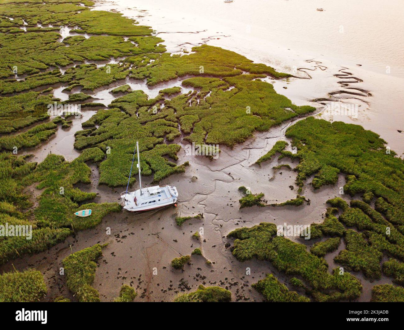 An aerial view of a catamaran sailing boat moored on a river bank Stock ...