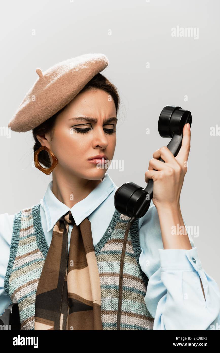 Displeased woman in beret hi-res stock photography and images - Alamy