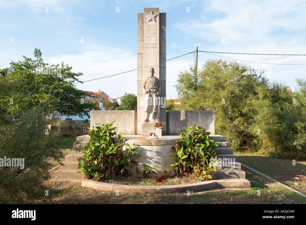 Illustrative photo, recreation, Croatian and European Union flag, EU, holidays, Second World War monument to partisans, Veli Iz, Island of Iz, Island Stock Photo