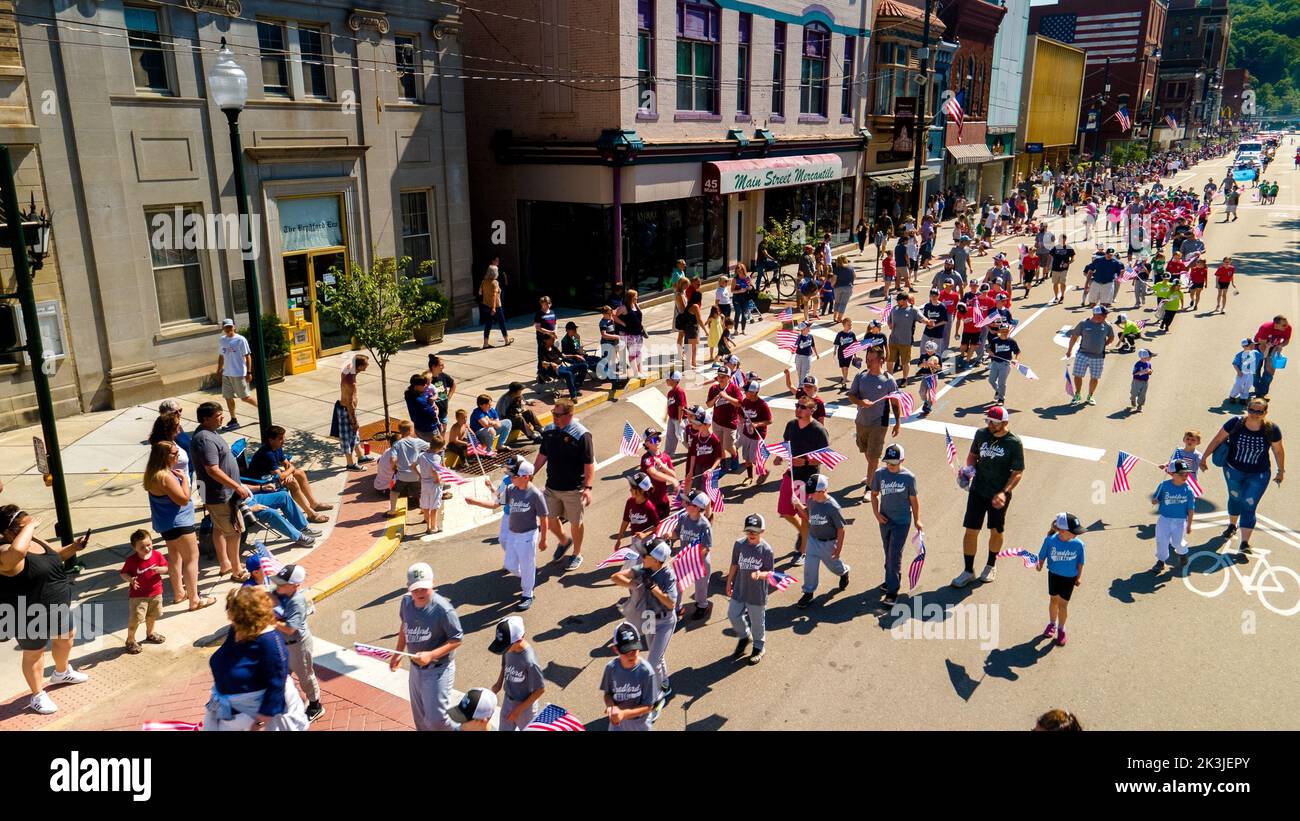 A crowd of people with flags at Memorial Day Parade in Bradford City