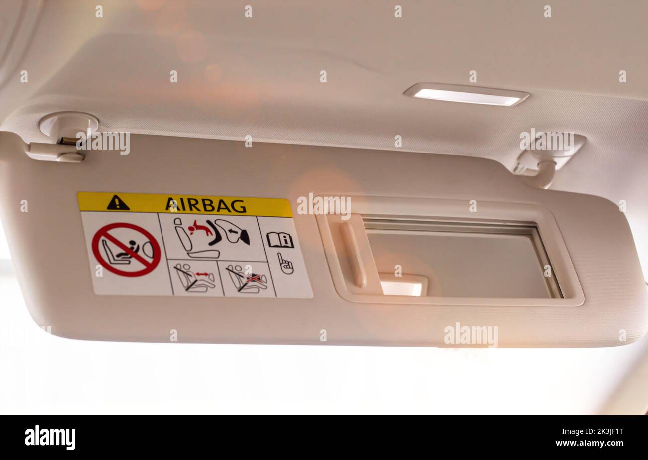 Modern car sun visor with mirror, close-up Stock Photo
