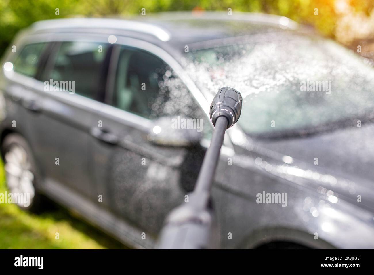 Hightech car wash with car shampoo with gloss and wax for paintwork in