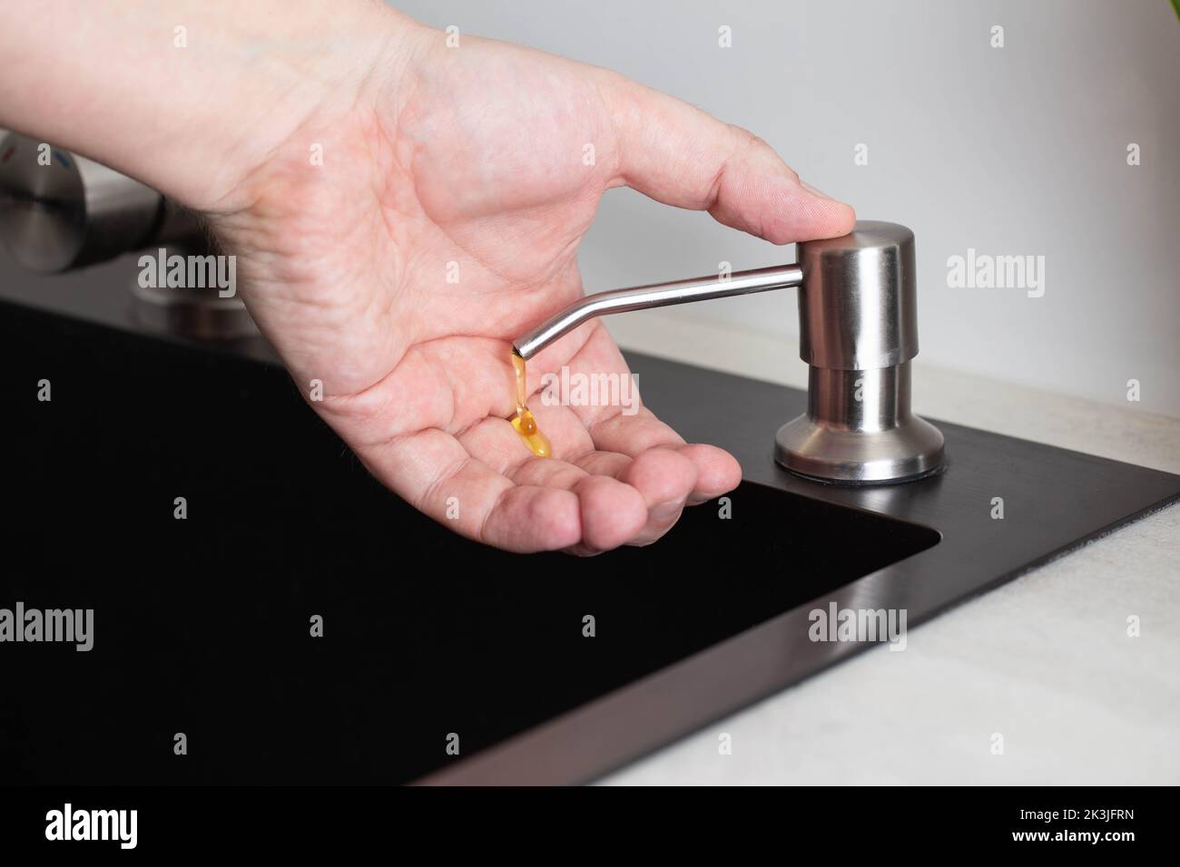 Dispenser for soap and hand hygiene. Modern dispenser built into the