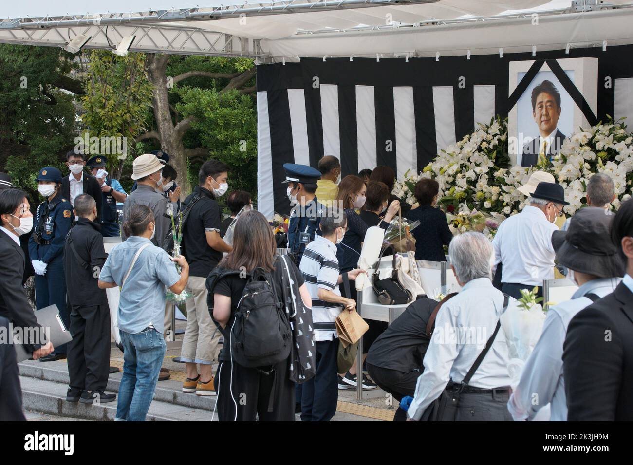 Tokyo, Japan. 27th Sep, 2022. People offer flowers at the memorial outside Nippon Budokan during state funeral of late former Japan's Prime Minister Shinzo Abe in Tokyo, Japan on Tuesday, September 27, 2022. Photo by Keizo Mori/UPI Credit: UPI/Alamy Live News Stock Photo