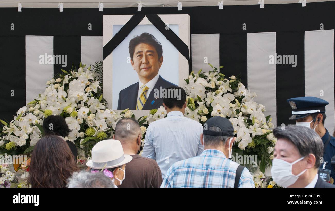 Tokyo, Japan. 27th Sep, 2022. People offer flowers at the memorial outside Nippon Budokan during state funeral of late former Japan's Prime Minister Shinzo Abe in Tokyo, Japan on Tuesday, September 27, 2022. Photo by Keizo Mori/UPI Credit: UPI/Alamy Live News Stock Photo
