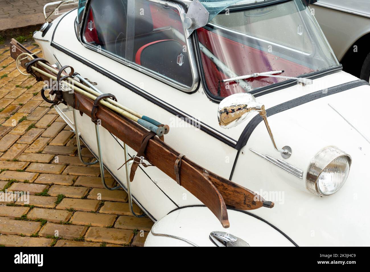 Messerschmitt KR-200 vintage car from 1955 with attached ski equipment on the side Stock Photo