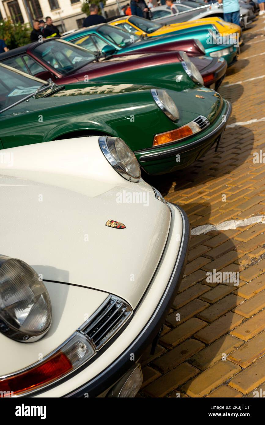 Row of classic Porsche 911 sports cars during the classic cars parade ...