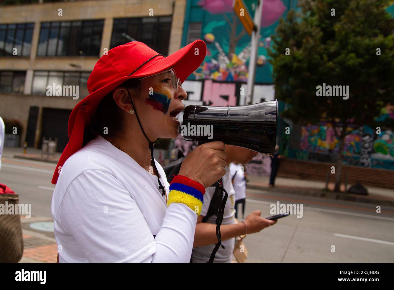 A demonstrator participates during the first antigovernment protest against left-wing president Gustavo Petro and his initiative on a tax reform, in B Stock Photo