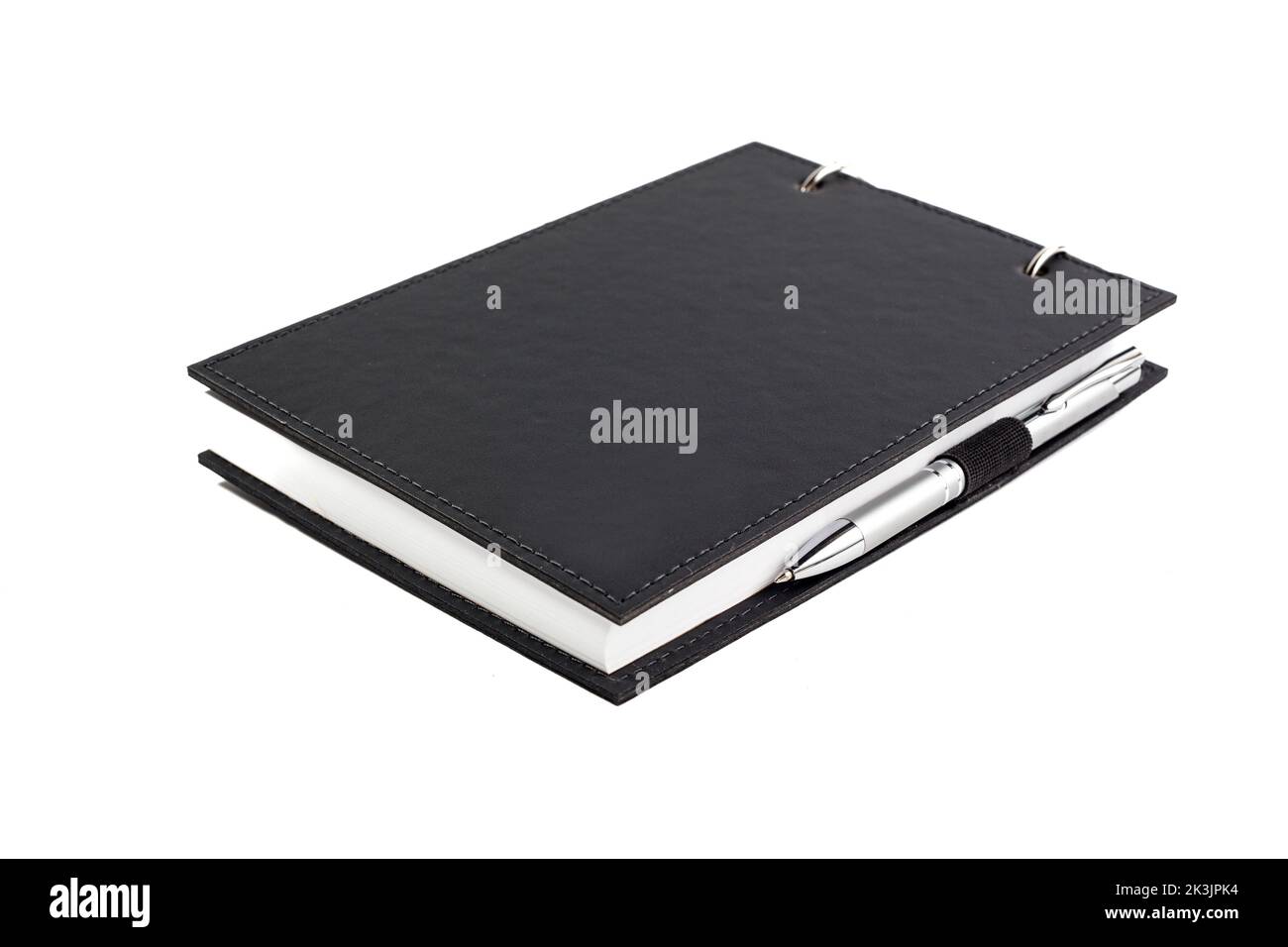 A notepad with pen isolated on a white background Stock Photo - Alamy