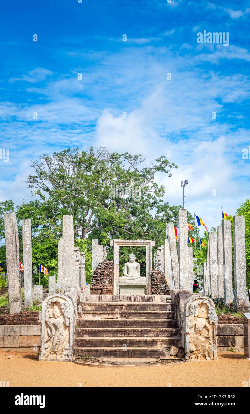 Thuparama Buddha statue and the temple ruins, a world heritage site in the sacred city of Anuradhapura. Stock Photo