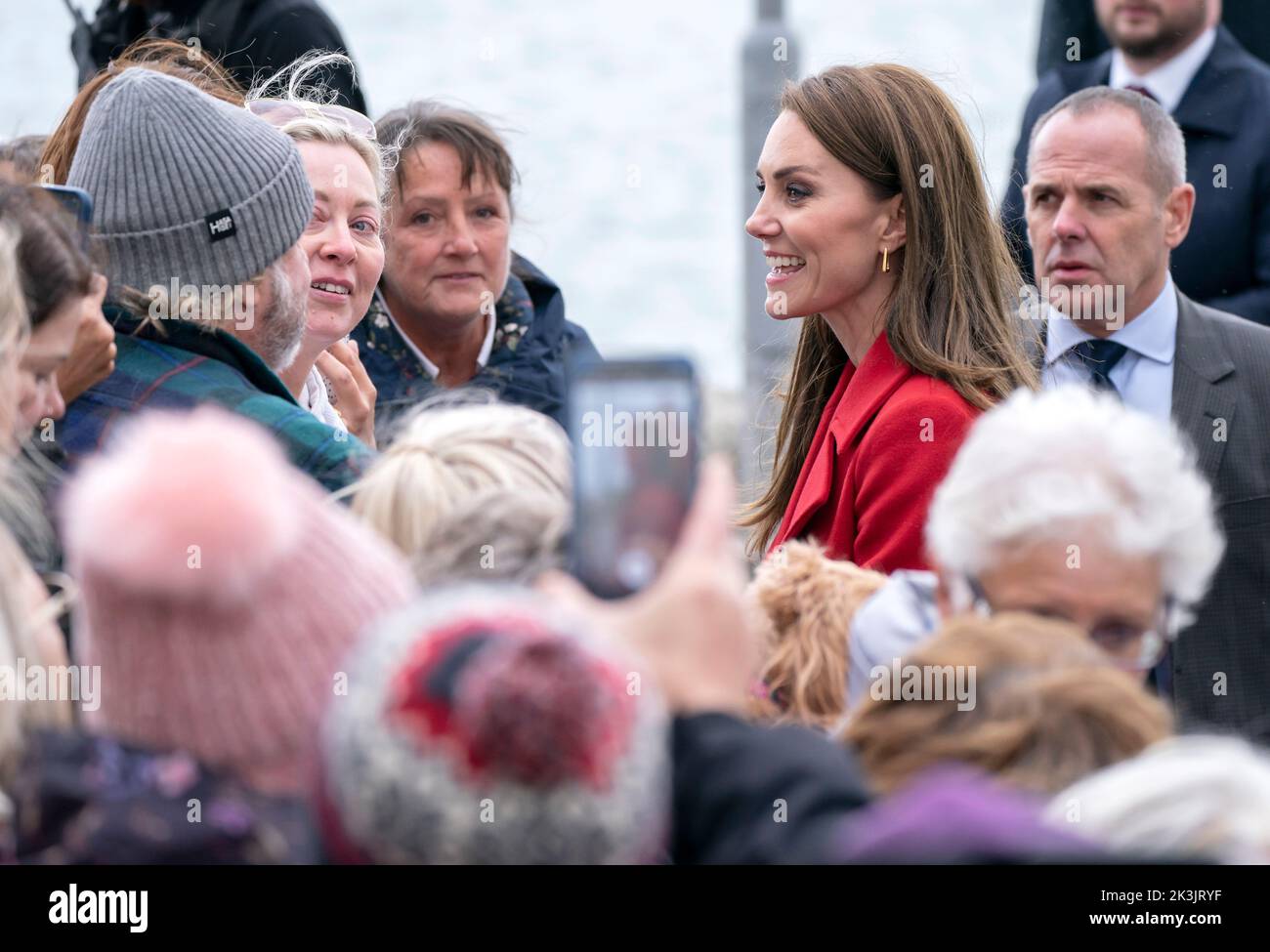 The Princess of Wales meets members of the public as they walk to the Holyhead Marine Cafe and Bar in Holyhead, Wales, where they are meeting representatives of small businesses and organisations, including the Coastguard and Sea Cadets. Picture date: Tuesday September 27, 2022. Stock Photo