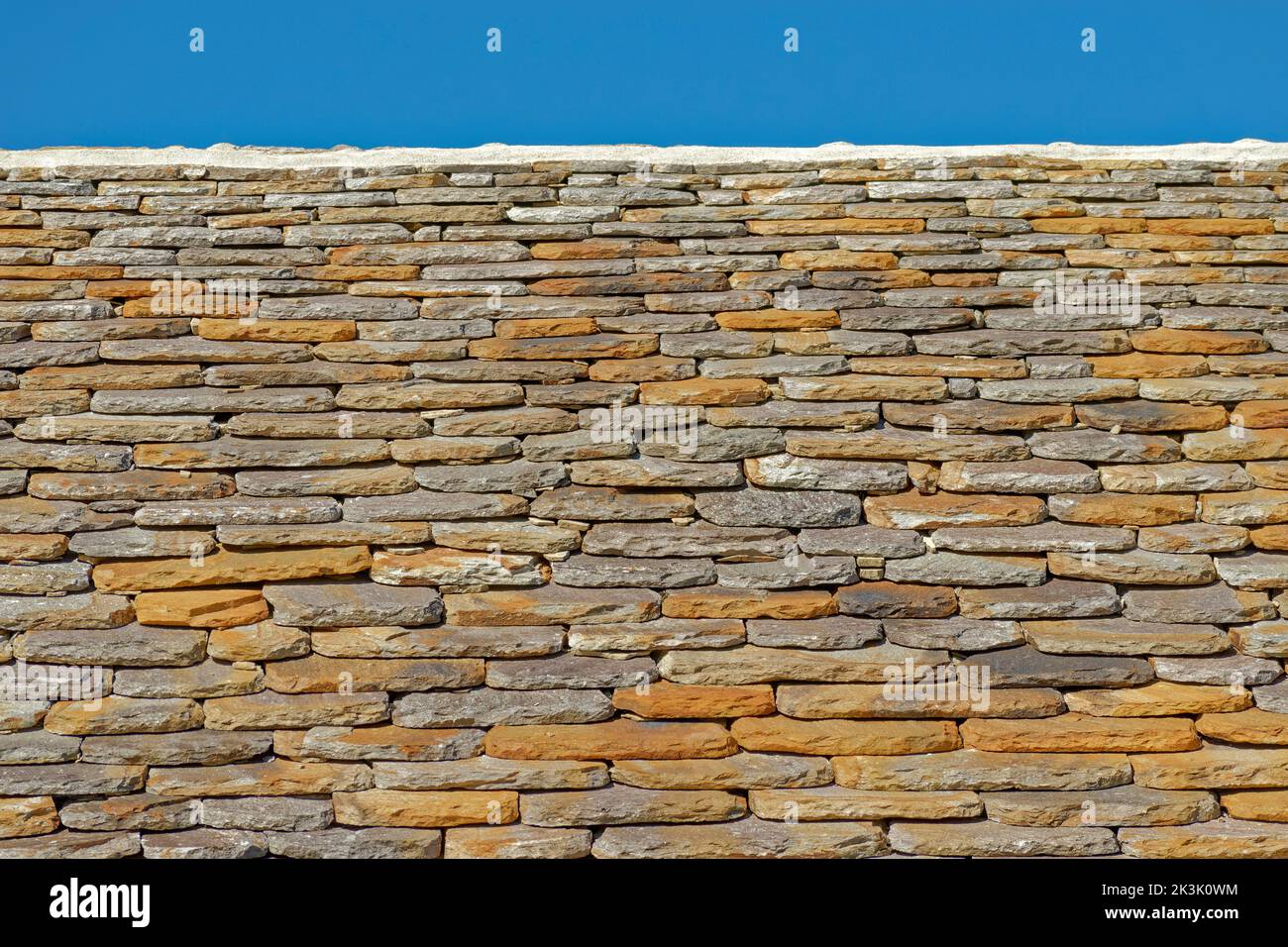 Flat stone roof tiles. Stock Photo