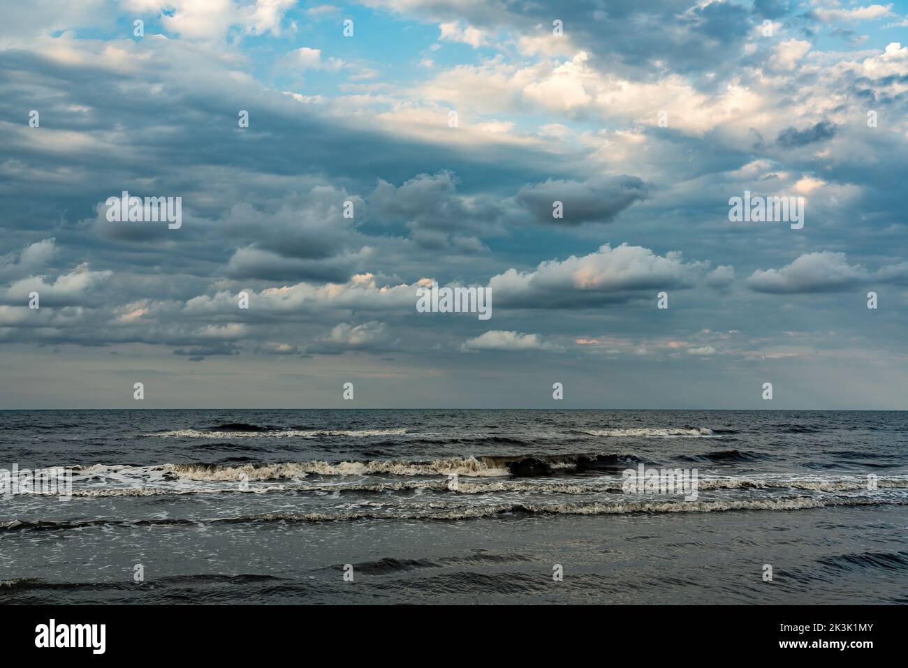 Beautiful clouds over the sea Stock Photo