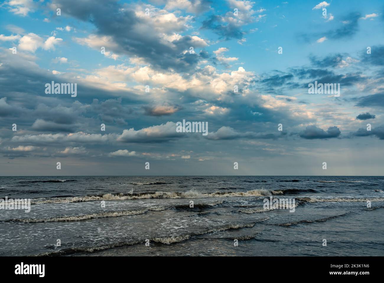 Beautiful clouds over the sea Stock Photo