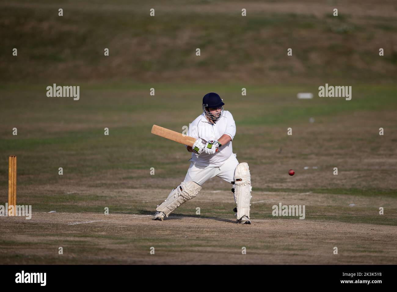Cricket bowling & batting mens game Stock Photo