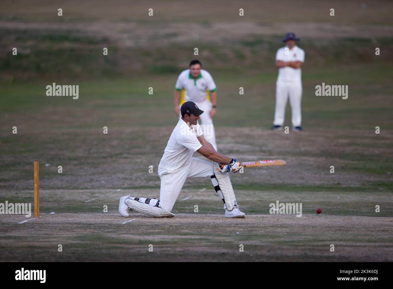 Cricket bowling & batting mens game Stock Photo Alamy