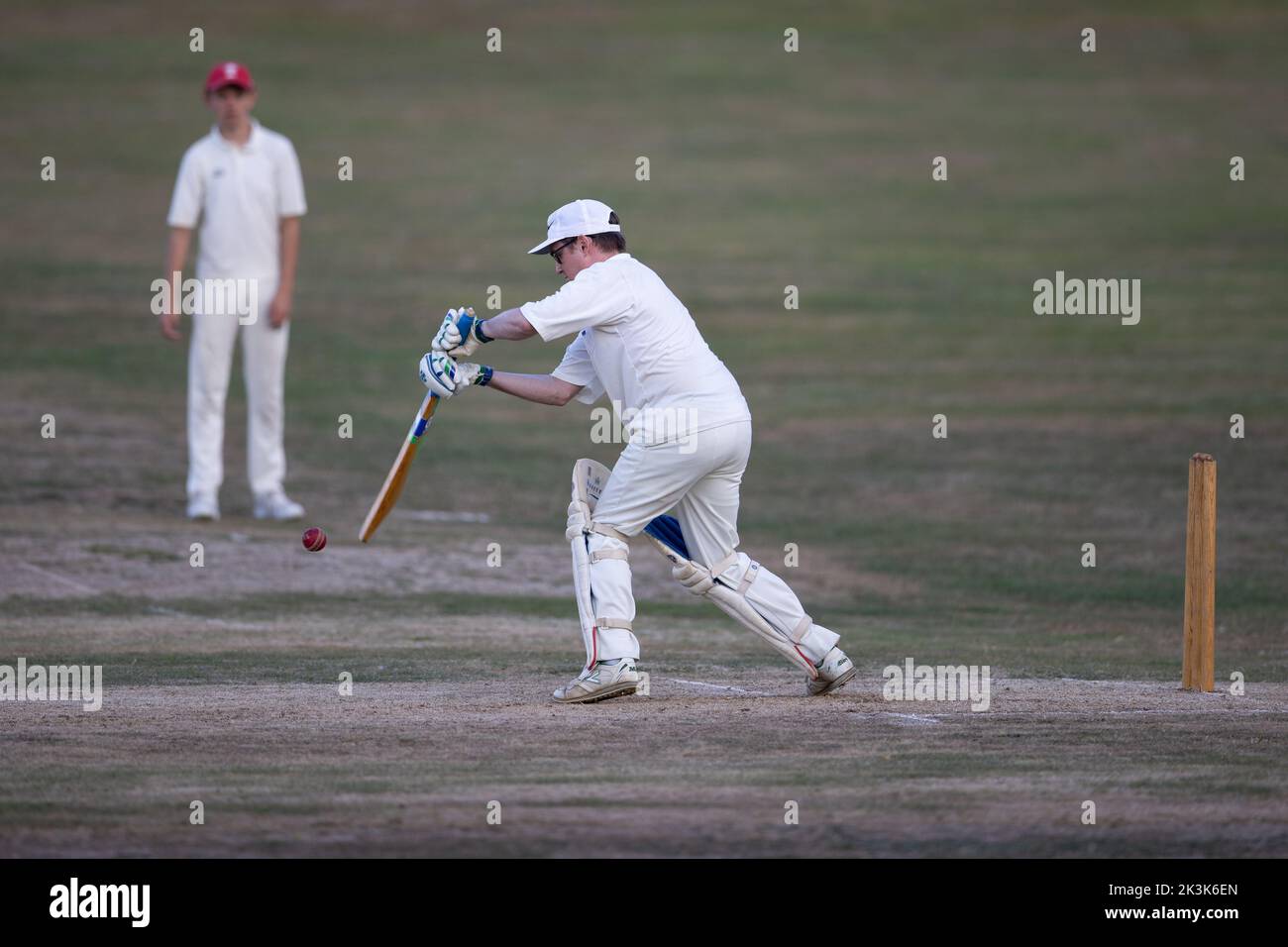 Cricket bowling & batting mens game Stock Photo Alamy