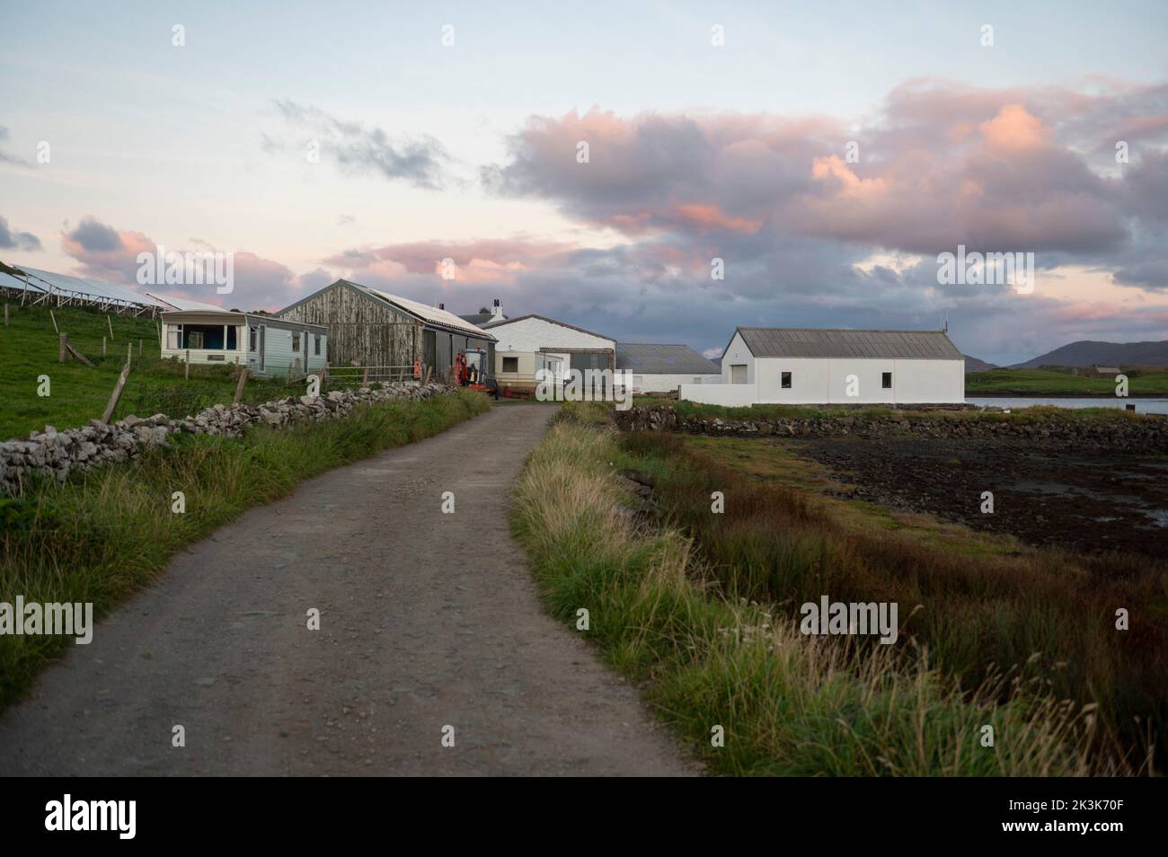 September 2022: Isle of Canna, Inner Hebrides, Scotland. The main road on Canna next to Canna Campsite and the farm Stock Photo