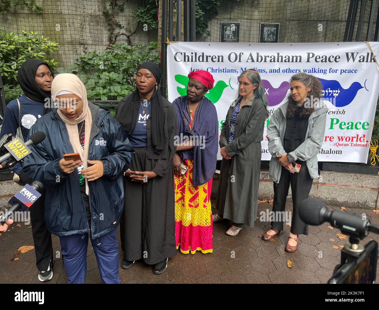 Members of various religious groups and religions come together by the