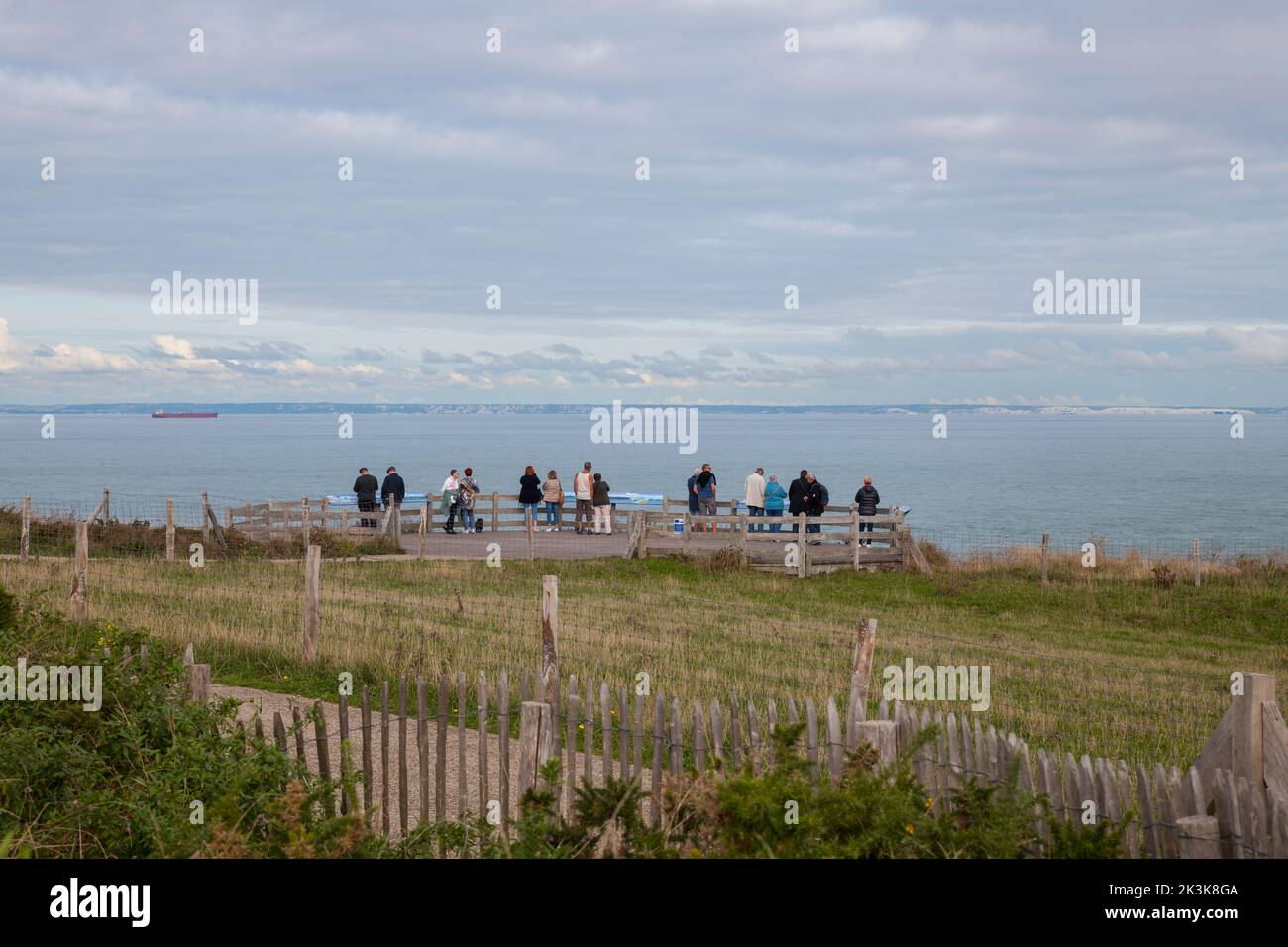 tourists on viewpoint on Cap Gris-Nez in france with england as background Stock Photo