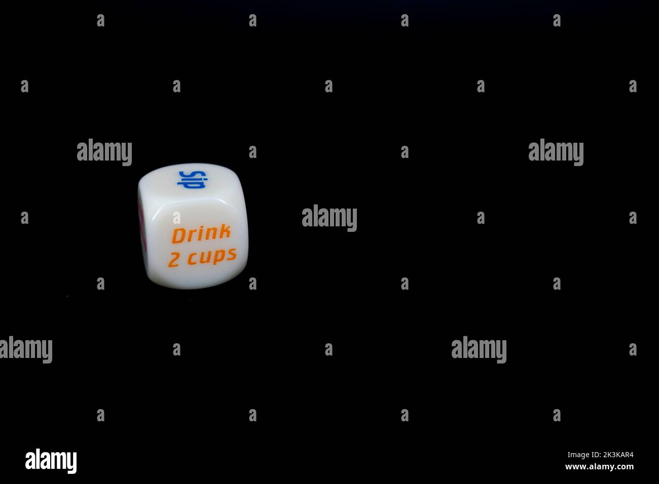 Drinking dice game isolated on black background Stock Photo