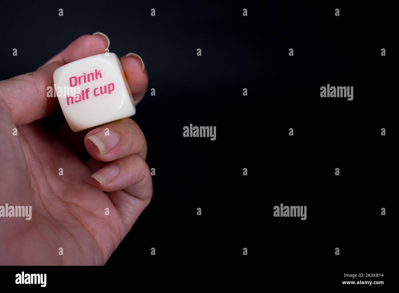 Drinking dice game isolated on black background Stock Photo