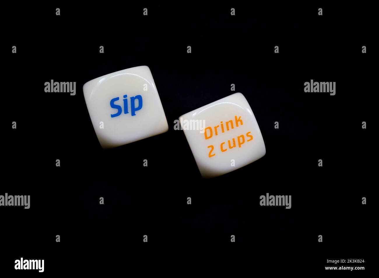 Drinking dice game isolated on black background Stock Photo