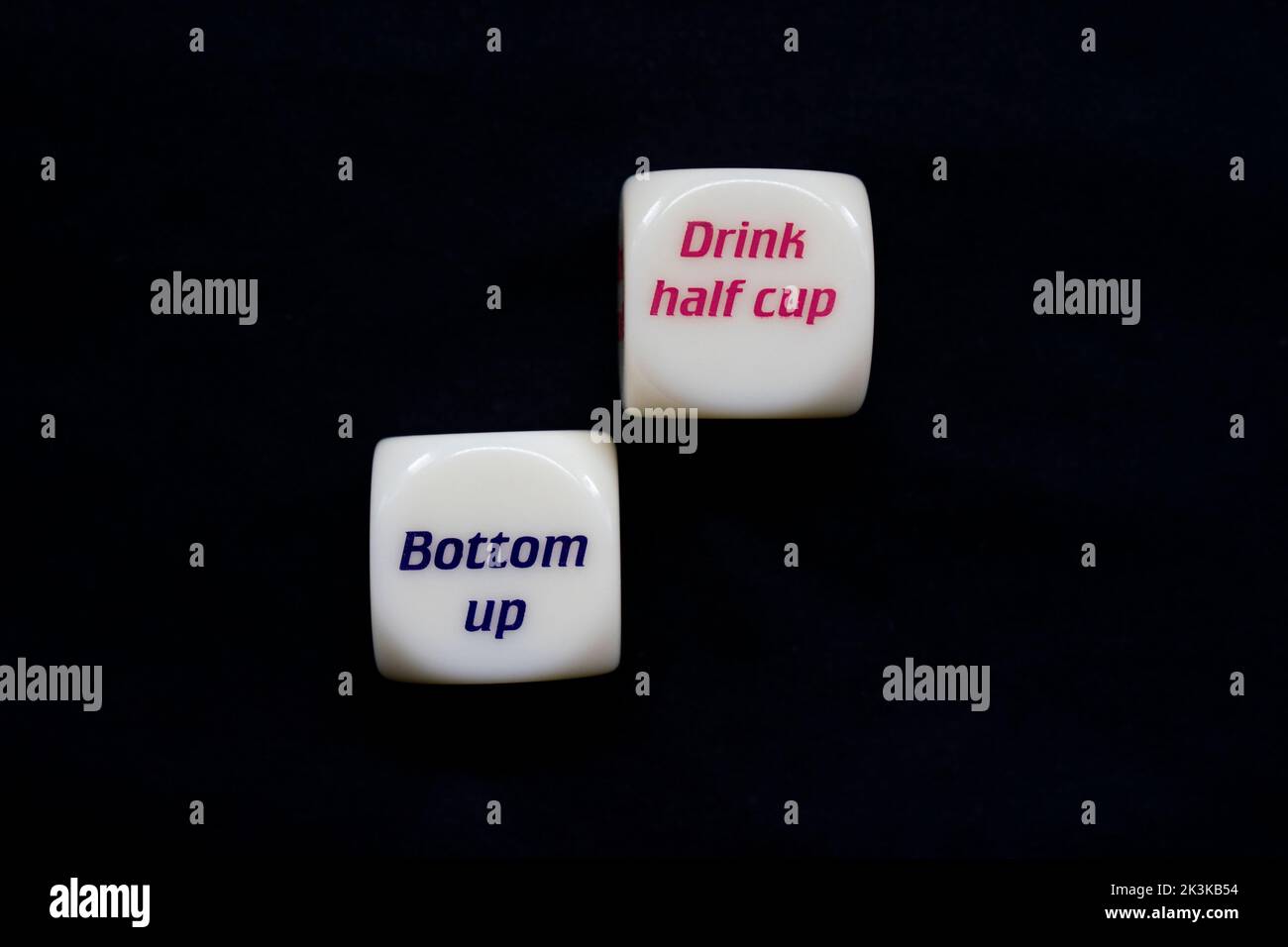 Drinking dice game isolated on black background Stock Photo