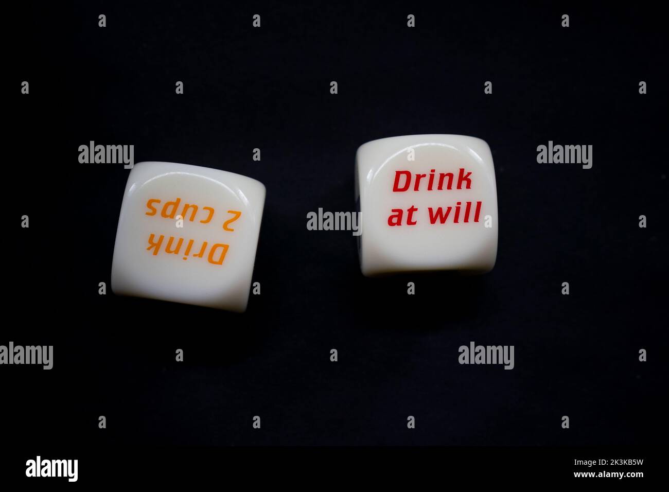 Drinking dice game isolated on black background Stock Photo