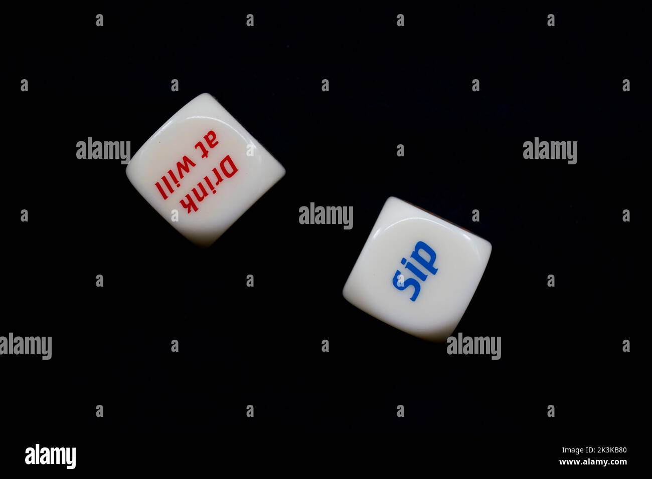 Drinking dice game isolated on black background Stock Photo