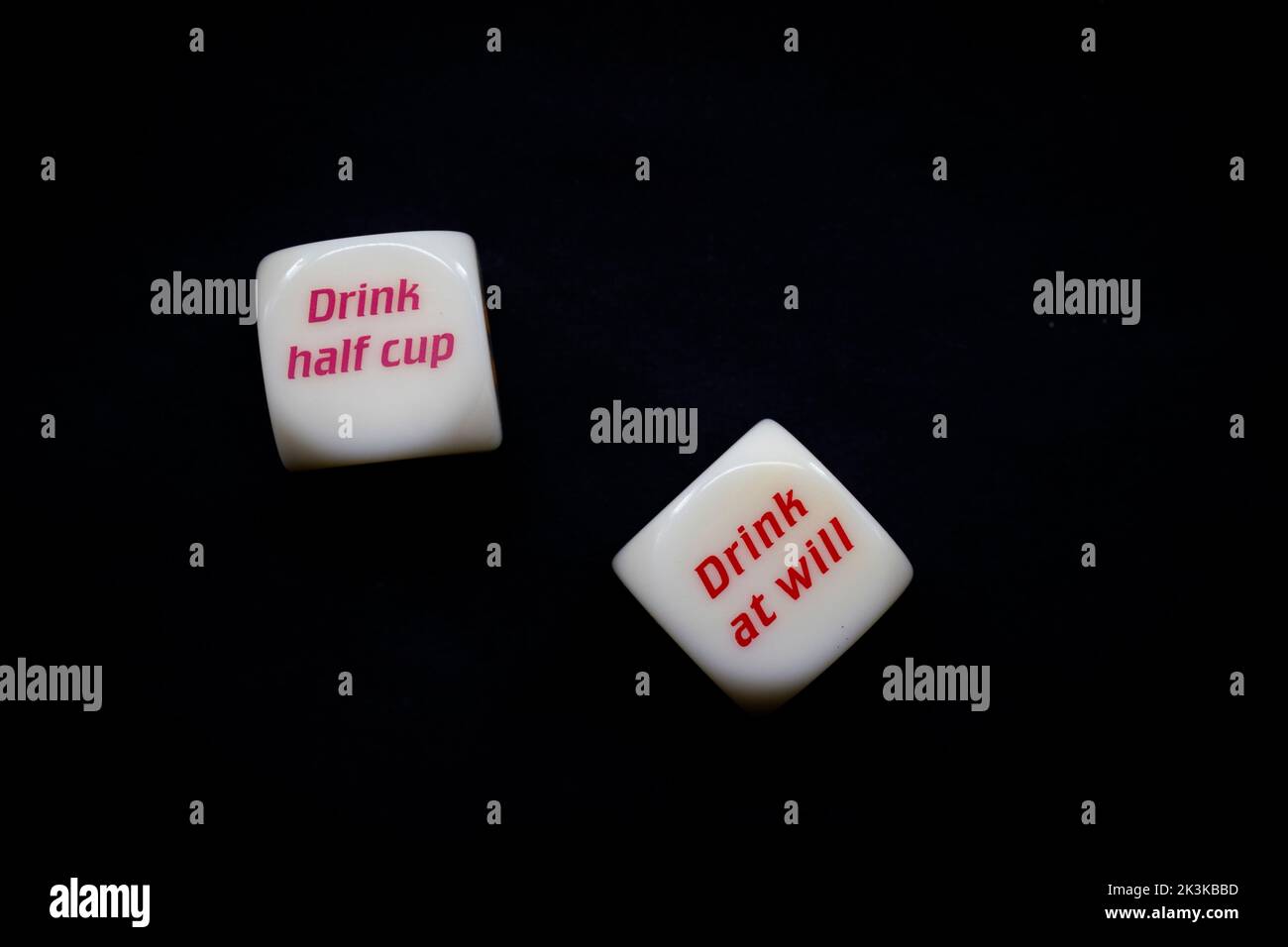 Drinking dice game isolated on black background Stock Photo
