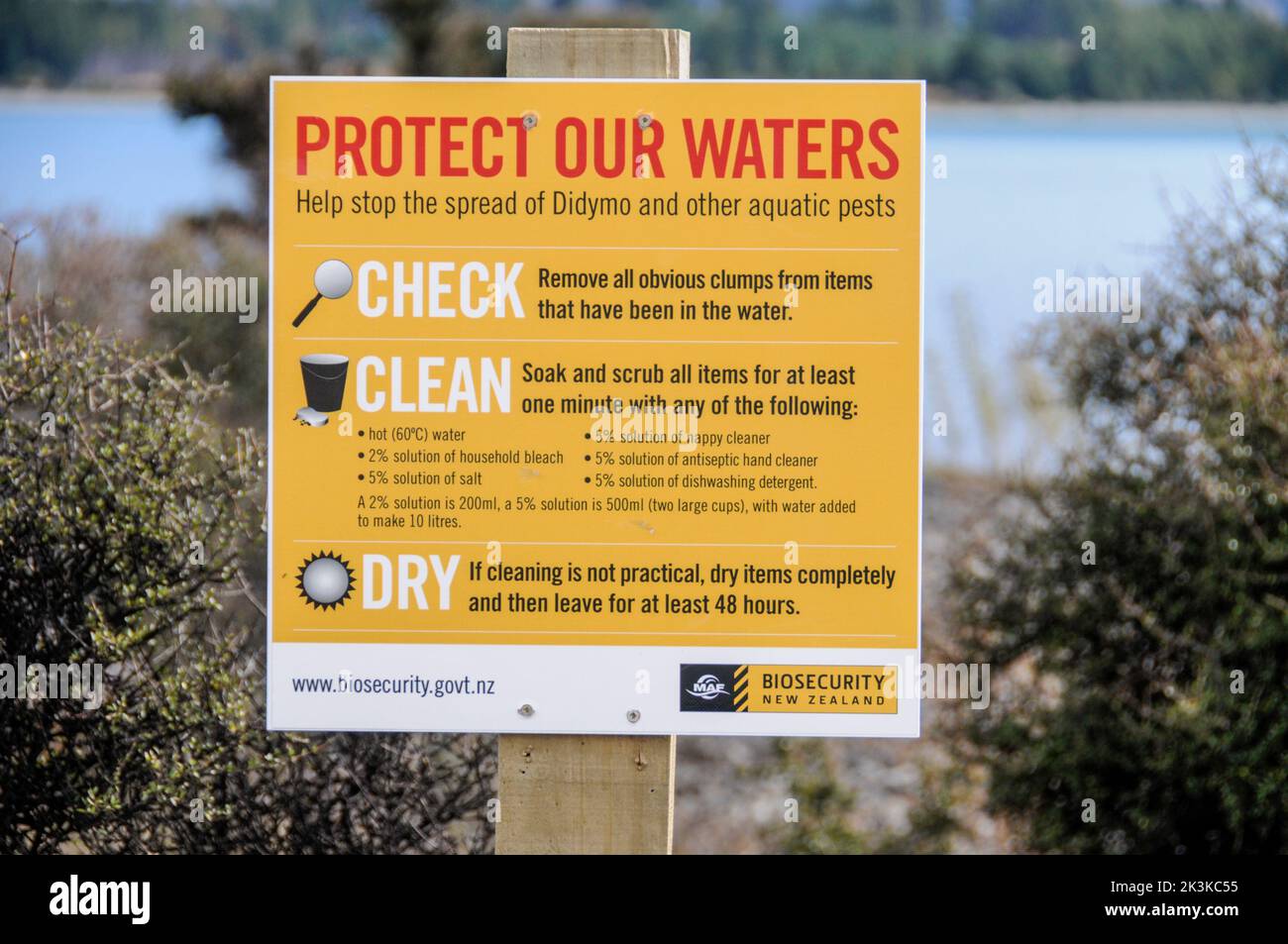An environment notice besides a lake in New Zealand, Stock Photo