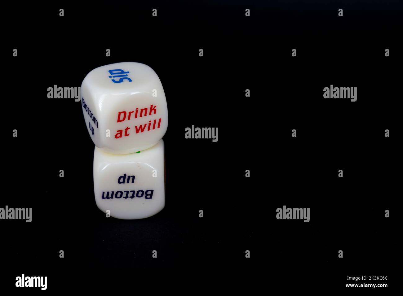 Drinking dice game isolated on black background Stock Photo