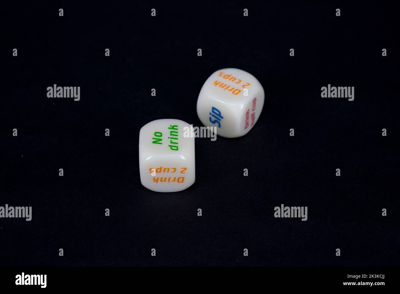 Drinking dice game isolated on black background Stock Photo