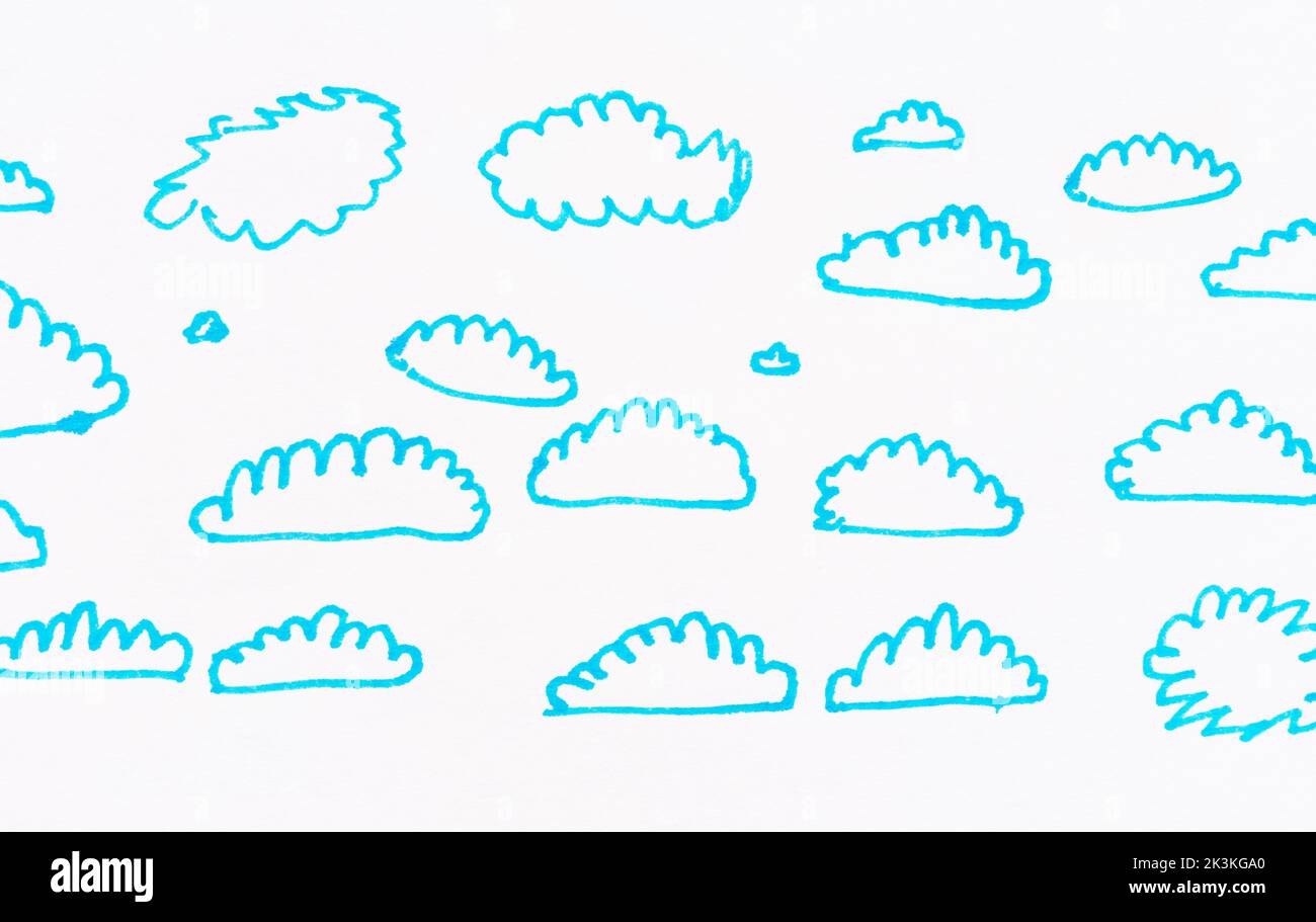 Blue clouds. A child hand drawing that was made using felt pens. Stock Photo