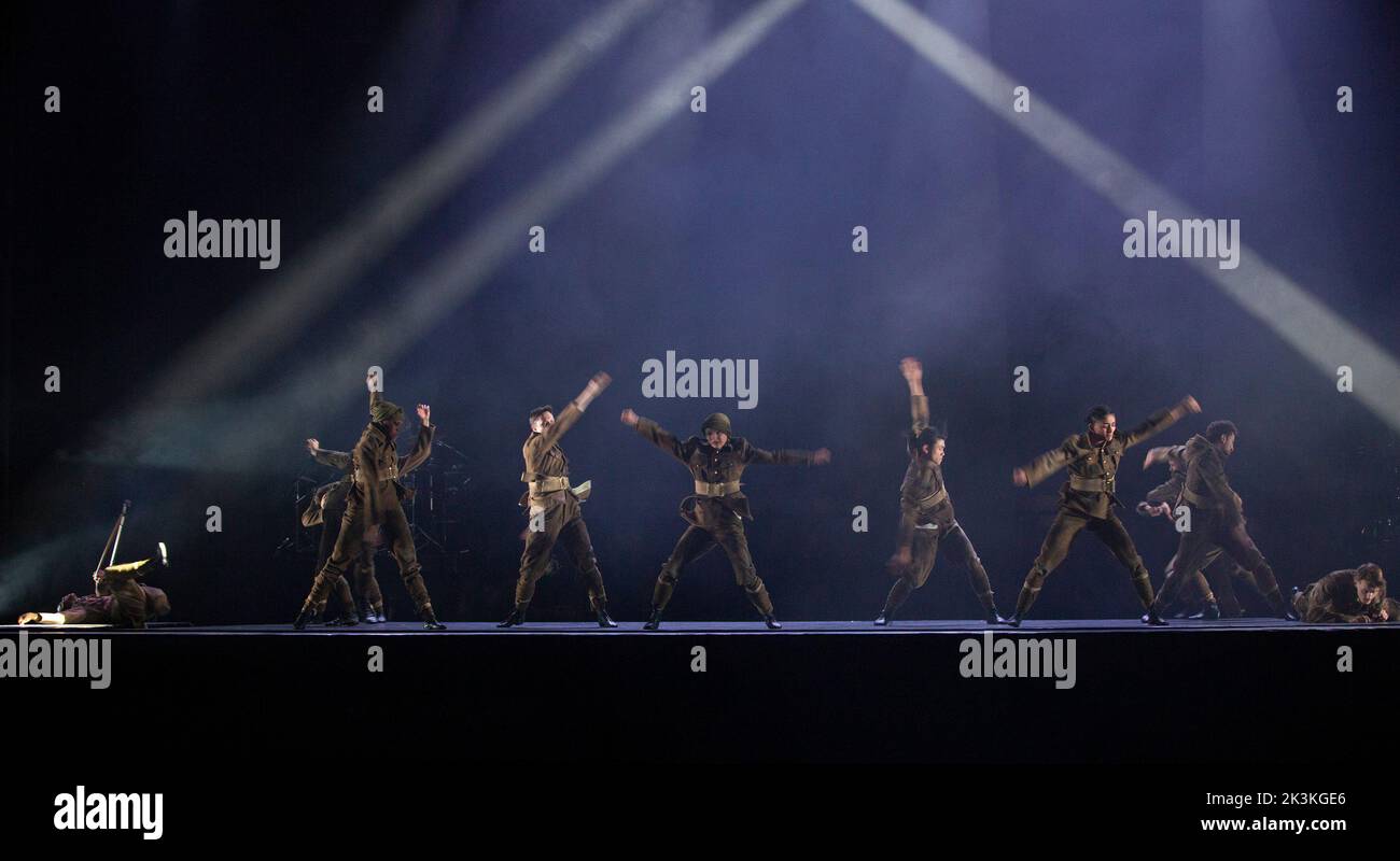 soldiers returned from the First World War in PEAKY BLINDERS: THE REDEMPTION OF THOMAS SHELBY presented by Ballet Rambert at the Birmingham Hippodrome, Birmingham, England  28/09/2022 written & adapted for the stage by Steven Knight  music: Roman GianArthur  music director: Yaron Engler  dramaturgy: Kaite O’Reilly  set design: Moi Tran  costumes: Richard Gellar  lighting: Natasha Chivers  fights: Adrian Palmer  choreographed & directed by Benoit Swan Pouffer Stock Photo