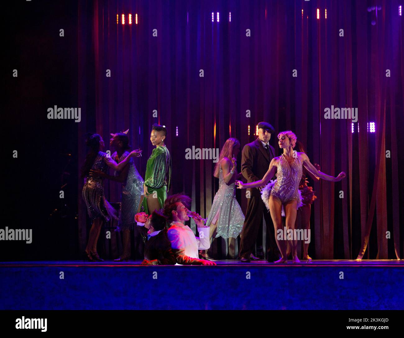 left, in green: Naya Lovell (Grace) in PEAKY BLINDERS: THE REDEMPTION OF THOMAS SHELBY presented by Ballet Rambert at the Birmingham Hippodrome, Birmingham, England  28/09/2022 written & adapted for the stage by Steven Knight  music: Roman GianArthur  music director: Yaron Engler  dramaturgy: Kaite O’Reilly  set design: Moi Tran  costumes: Richard Gellar  lighting: Natasha Chivers  fights: Adrian Palmer  choreographed & directed by Benoit Swan Pouffer Stock Photo