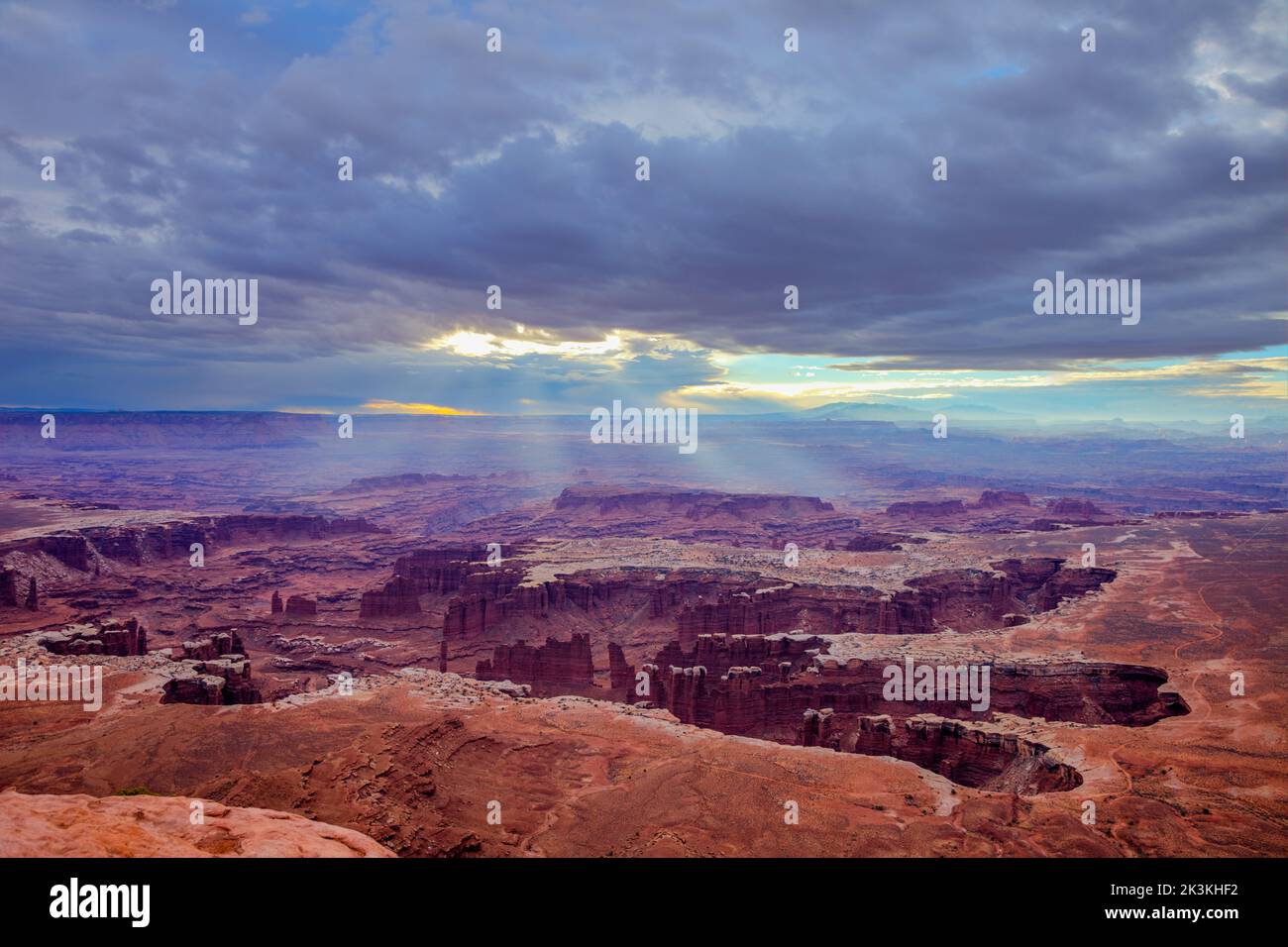 Sun Rays & Storm Clouds Over Monument Basin With The Needles District ...