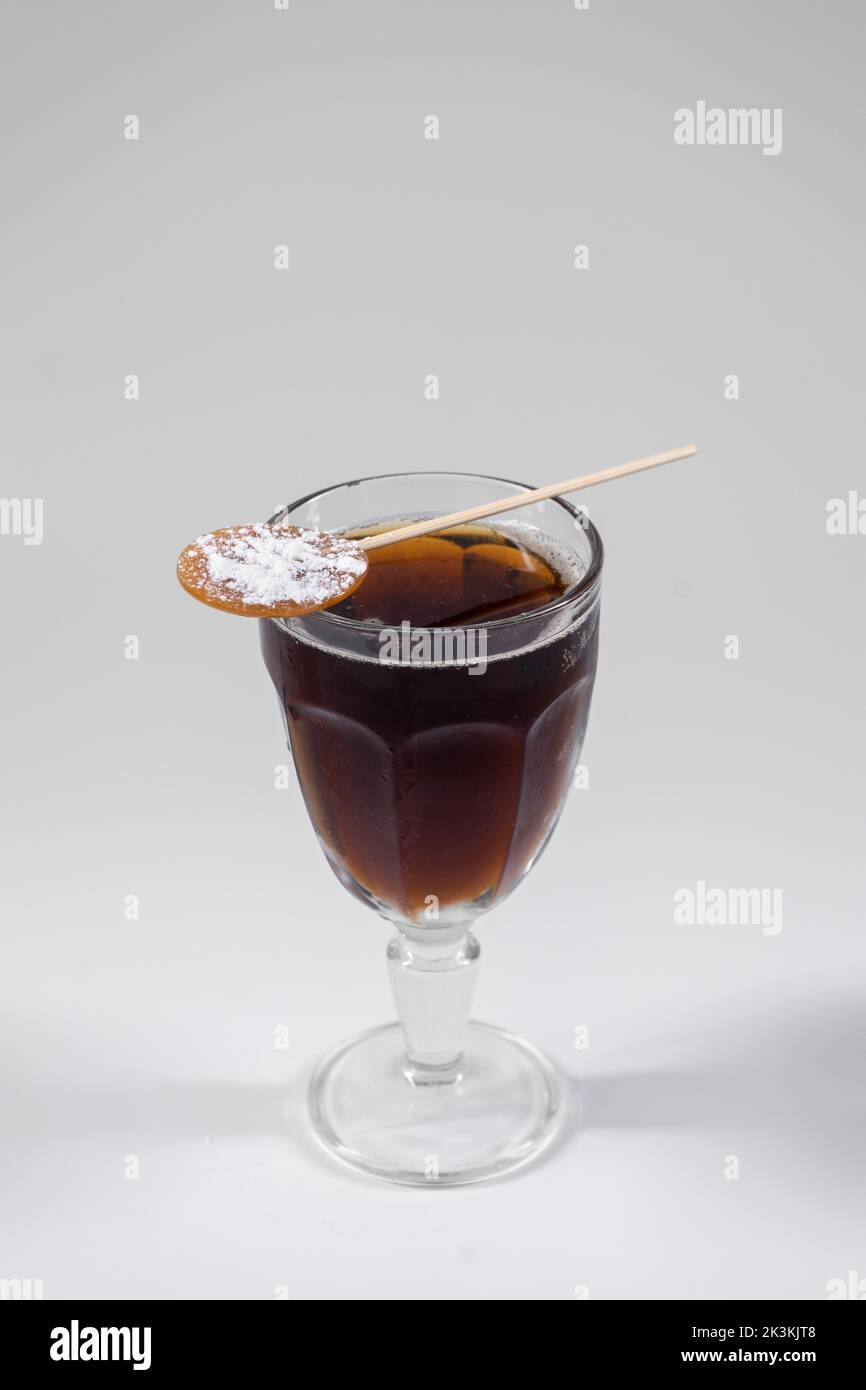 brown cube libre cocktail with cola, brandy or rum or whiskey isolated ...