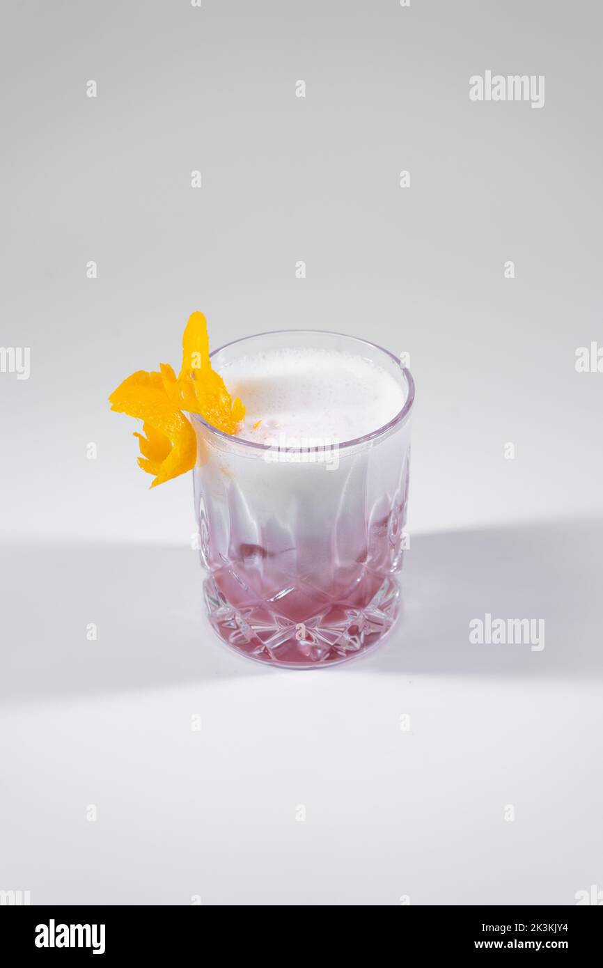 fresh pink clover club or sour cocktail with raspberry or red wine Stock Photo