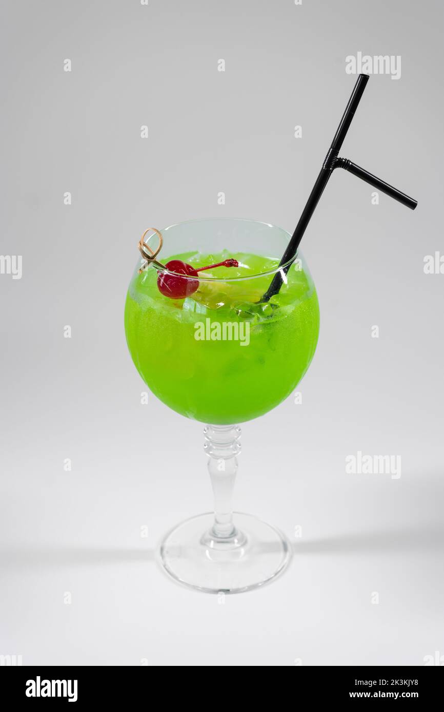 fresh green midori sour cocktail with liquor isolated Stock Photo Alamy