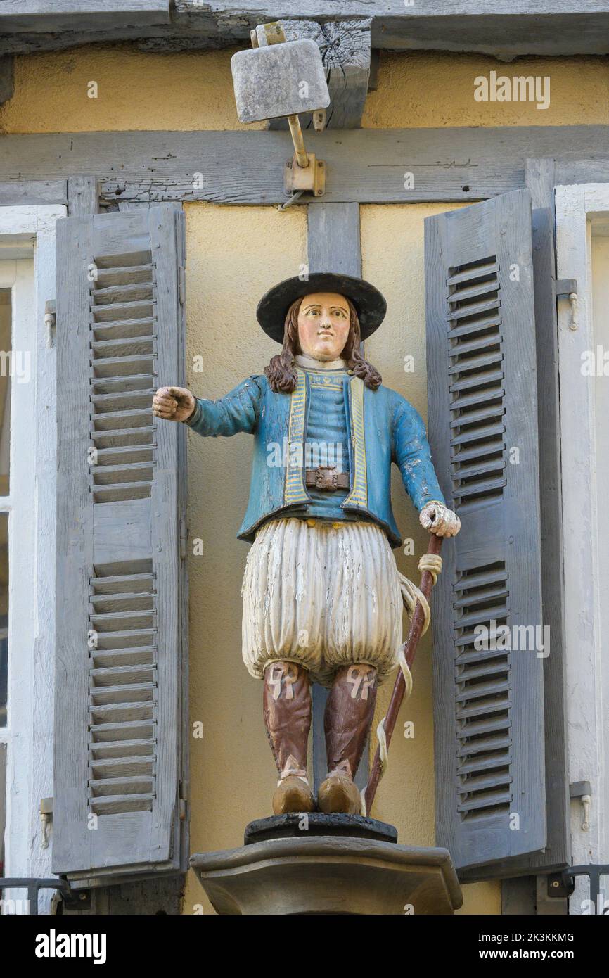 Painted figure on a building in the historic centre of Quimper Finistere Brittany France Stock Photo