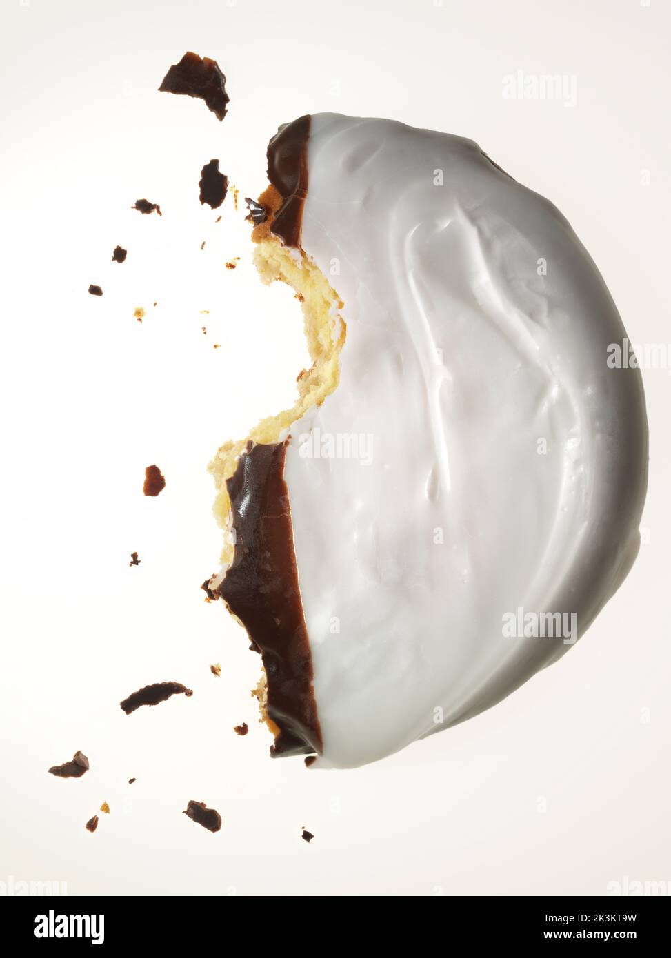 Black and White cookie half eaten Stock Photo